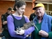 Kiwi held by admirers prior to her release into the Rimutaka Forest Park