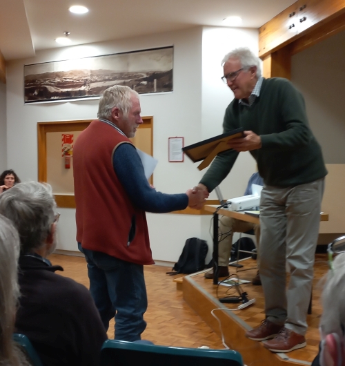 Geoff presenting 10 Year Service Certificate to Simon